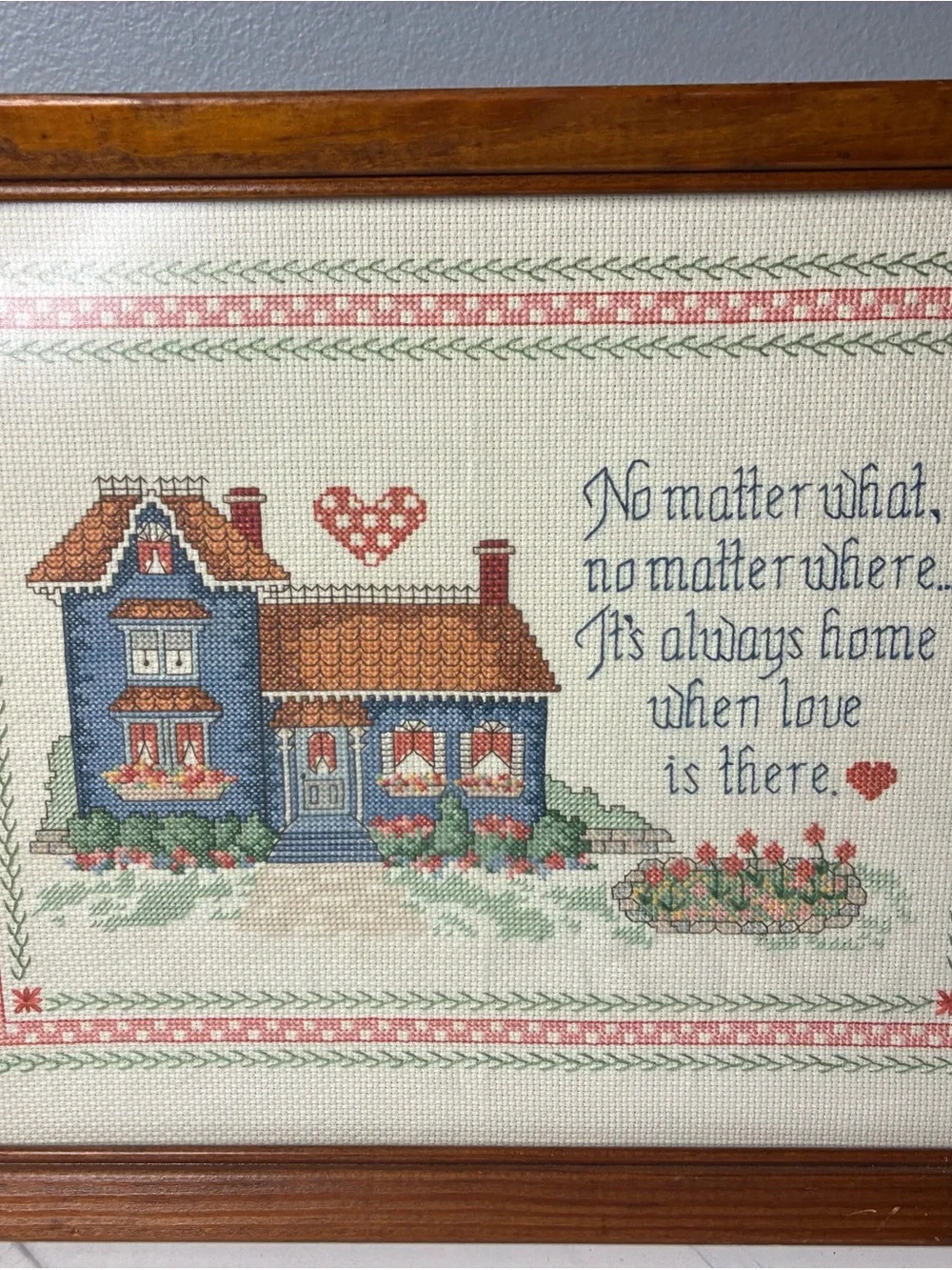 Framed Cross Stitch Home Sampler with Blue House and Quote